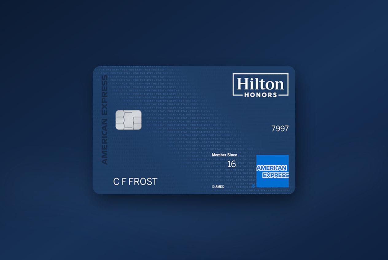 The Hilton Honors American Express Surpass Card on a deep blue background